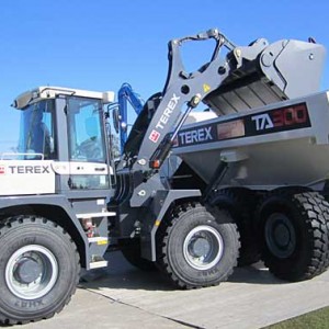 The TL260 shown in tandem with the TA300 articulated dump truck.