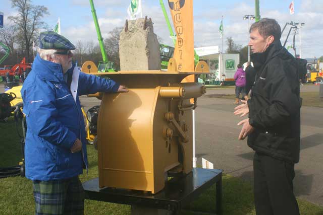 Mike Williams (right) outlines the advantages of the pile breaker at ScotPlant.